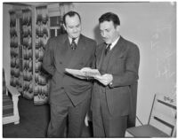 Assemblymen Jack Tenney and Sam Yorty at hearings for charges of Communist activity against members of the Los Angeles County S.R.A., Feb. 5, 1940