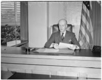 Judge Stanley Moffatt at his desk, Huntington Park