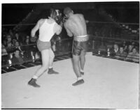 Ceferino Garcia, champion boxer from the Philippines, during a fight, Los Angeles, circa 1938