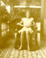Guardia daughter sitting on a chair