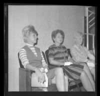 Friends of Elaine Kirschke waiting to testify at the trial of her husband, Jack Kirschke, who was accused of killing her, Los Angeles, 1967