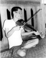 Blind man playing the violin