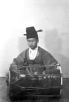 Dong Youp Lee playing a drum