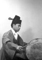 Dong Youp Lee playing a drum