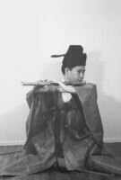 Dong Youp Lee playing a woodwind instrument