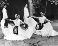 Four Latin American dancers of UCLA Grupo Folklorico - Ballet Folclórico of the University of Guadalajara's Escuela de Artes Plásticas
