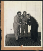 Jazz musicians Erskine Hawkins, Joe Morris, and Lionel Hampton backstage at the Orpheum, Los Angeles, 1940s