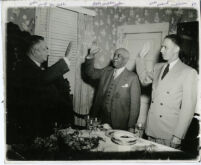 Attorneys Hugh MacBeth, Willis Tyler, and David Williams taking an oath, Los Angeles, 1940s
