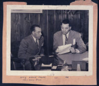 Lawyers Aaron Payne (Chicago) and Walter L. Gordon, Jr. in Gordon's office, Los Angeles, 1940s