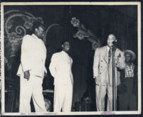 Ben Carter and Henry Armstrong on stage, 1940s