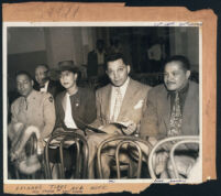 Mr. and Mrs. Leonard Tibbs, Walter L. Gordon, Jr., James Garcia and Floyd Snelson at a fashion show, Los Angeles, 1940s