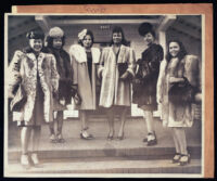 Six African American women in fur coats, 1940s