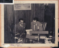 Lawyers Aaron Payne (Chicago) and Walter L. Gordon, Jr. in Gordon's office, Los Angeles, 1940s