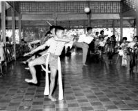 Javanese boys studying dance with dance instructor