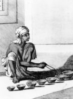 Photo of an engraving of an Indian playing jalatarang