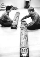 Two individuals (Yoko Tahara and Bob Brown) playing koto at UCLA
