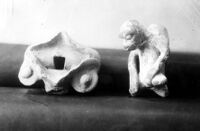 Two clay figures