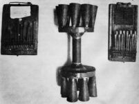 Two lamellophones (similar to mbira) and a multiple bell in the shape of a dumbell
