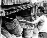 Stretching the hide-rope to dry it