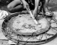 The outside drumhead is treated with an application of wood ash and shaved using a sharp bamboo tool
