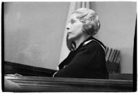 Evangelist Aimee McPherson appearing in court to confront a suit brought against her, Los Angeles, 1935