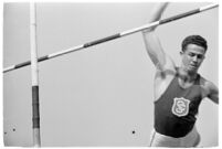 USC high jumper in mid-leap at a track meet, Los Angeles, 1937