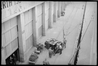 Workers handling luggage outside of the S.S. Mariposa, Los Angeles