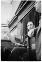 Boy Scout Frank Portune testifies for the court regarding the discovery of the bodies of murdered children Jeanette Stevens and Melba and Madeline Everett.  August 12, 1937.