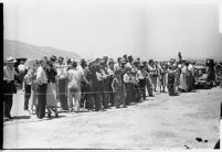 Crowd gathers to catch a glimpse of the airplane that set a world record, flying non-stop from Moscow to southern California.  July 14, 1937.