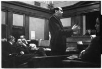 Defense attorney Jerry Giesler in court during the trial of accused murderer Paul A. Wright, Los Angeles, 1938.