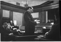 Defense attorney Jerry Giesler in court during the trial of accused murderer Paul A. Wright, Los Angeles, 1938.