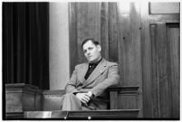Ambulance driver Harry T. Meredith on the witness stand during the murder trial of Paul A. Wright, Los Angeles, 1938