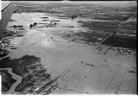 Aerial view of flooded crops and homes in North Hollywood, Los Angeles, 1938