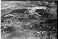 Aerial view of flooded neighborhoods and crops in North Hollywood, Los Angeles, 1938
