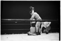 Heavyweight wrestler El Pulpo grappling with an opponent at the Olympic Auditorium, Los Angeles, 1937
