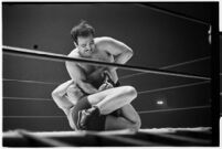 Wrestling match between Italian newcomer Vincent Austeri and Salt Lake City native Del Kunkel at Olympic Auditorium, Los Angeles, 1938