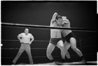 Wrestling match between Italian newcomer Vincent Austeri and Salt Lake City native Del Kunkel at Olympic Auditorium, Los Angeles, 1938