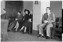 Private detective Pearl Antibus appears in court with her daughter Norma Thelan and son Robert Antibus during her trial against millionaire Thomas W. Warner, Sr, Los Angeles, 1938