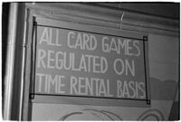 Sign detailing policies hanging inside of a casino, Los Angeles, 1937