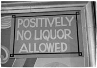 Sign detailing policies hanging inside of a casino, Los Angeles, 1937