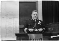 Police Chief James E. Davis testifying before the grand jury about the attempted murder of Harry Raymond, Los Angeles, 1938