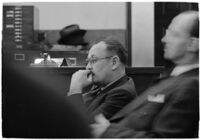 Police Captain Earle E. Kynette sits in court after being charged with conspiracy to commit murder, Los Angeles, 1938