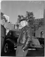 Deputy Sheriff George R. Burns smiling at the camera, Los Angeles
