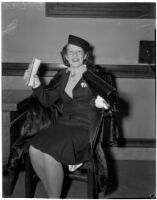 Elizabeth Caler rejoices after a judge granted her a divorce from Don Lee Caler, Los Angeles, 1940