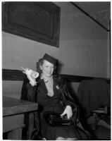 Elizabeth Caler rejoices after a judge granted her a divorce from Don Lee Caler, Los Angeles, 1940