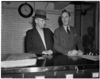 Alleged blackmailer George Wallace, alias Robert M. Nixon, with U.S. Marshal William S. Sweeney, Los Angeles, 1940