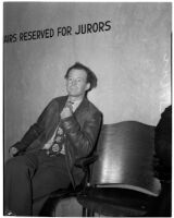Joe E. Barnes sits in a chair reserved for jurors only, Los Angeles