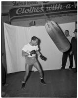 Boxer Henry Armstrong trains with a punching bag, Los Angeles, 1930s