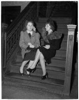 Jean Rose and her mother Josephine Rose in the courthouse after receiving a settlement, Los Angeles, 1940