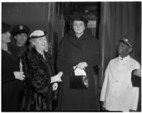 Antoinette Jones welcomes Secretary of Labor Frances Perkins upon her arrival by train, Los Angeles, 1940